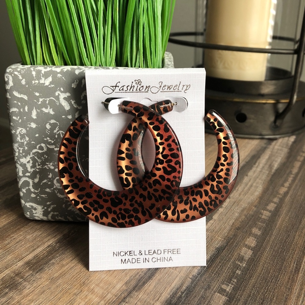 Leopard print earrings.